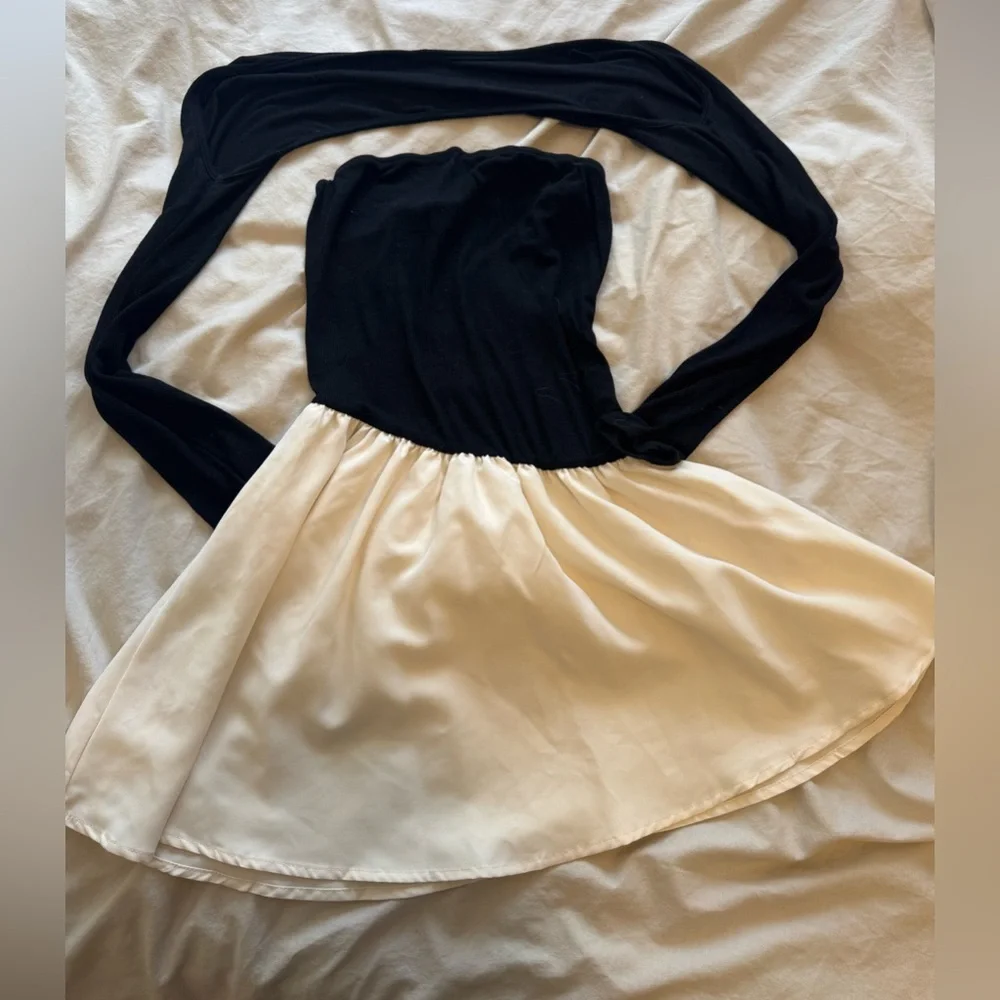 Elegant Black and cream Two Tone Pleated Hem Dress